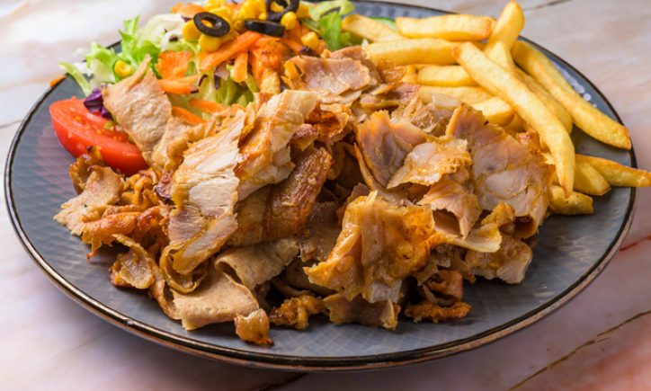 isolated view of a Turkish kebab combo platter,